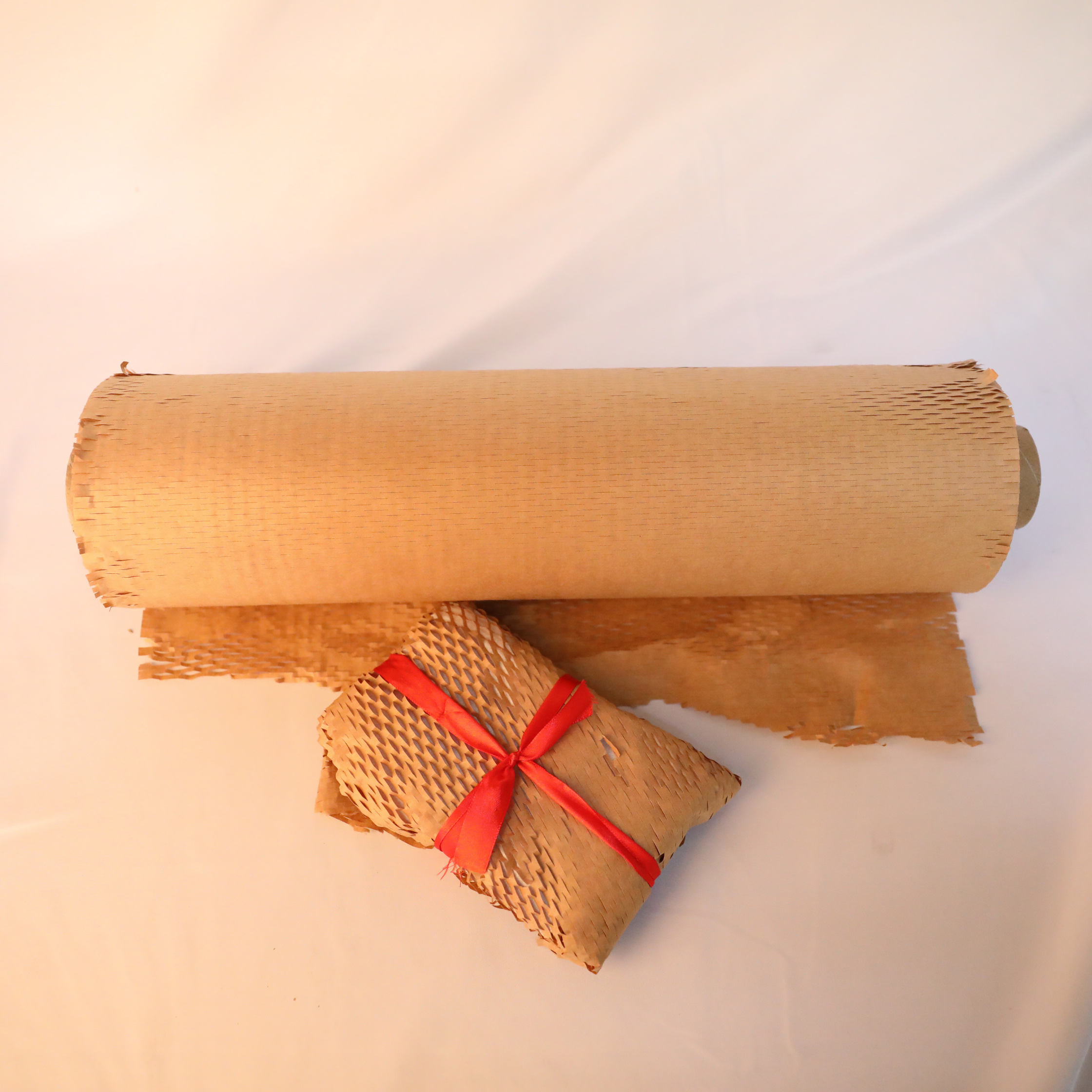 商品を梱包するための堆肥化可能なグリッドハニカム紙